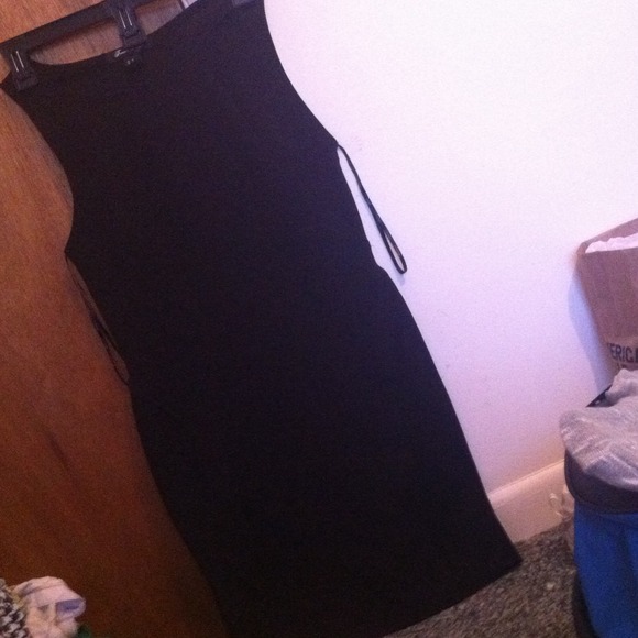 Plain little black dress. Never worn