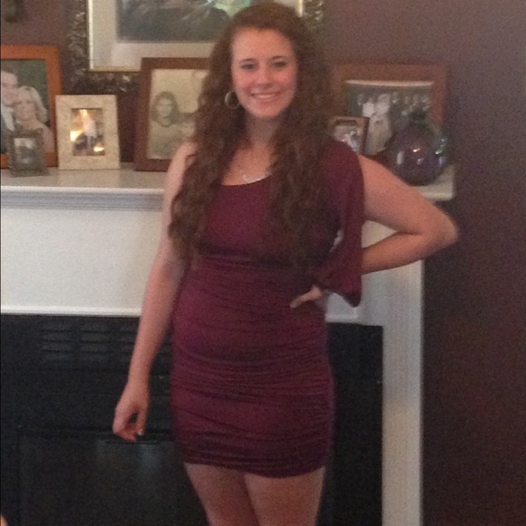 Semi formal dress. One sleeve.