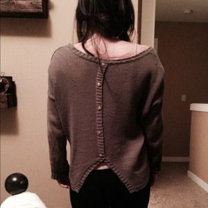 Green sweater with button up back