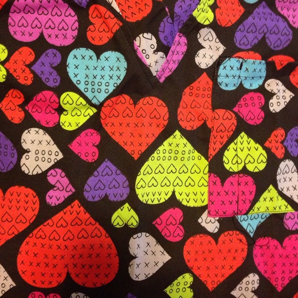 Set of two scrub tops, size medium!