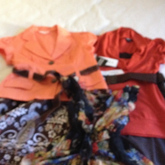 Two top & skirt sets & pretty ruffle blouse.