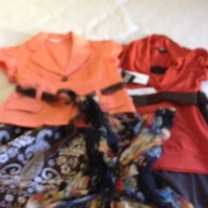 Two top & skirt sets & pretty ruffle blouse.