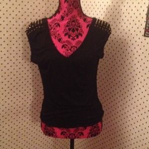 Black top with gold shoulder studs