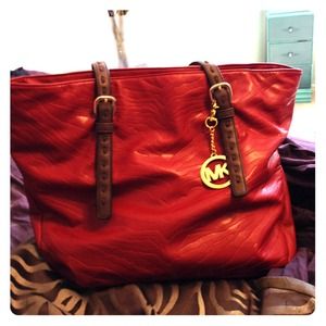Currently not for sale!! Michael kors red leather