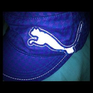 Blue and purple lightly worn Puma baseball hat.