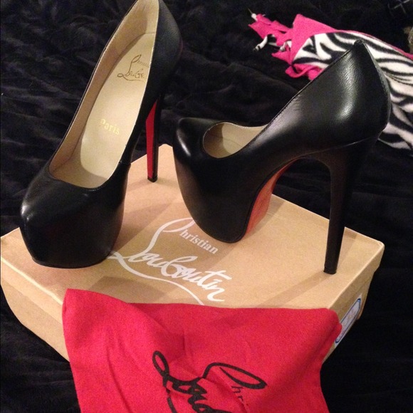Christian Louboutin brand new. Never worn!