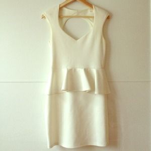 White peplum dress with cutout in the back