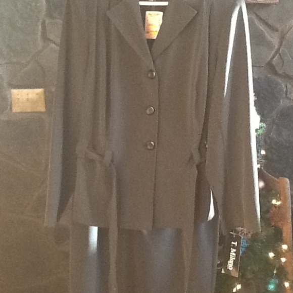 Two piece dressy jacket and skirt.