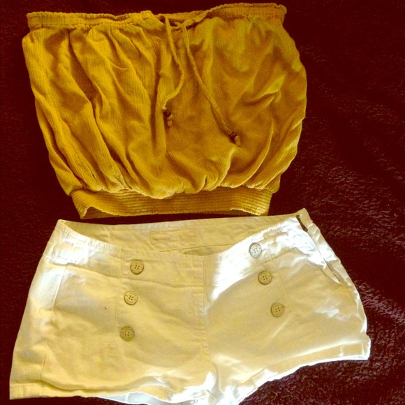 Mustard strapless and off-white shorts.
