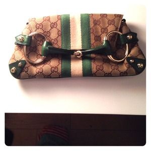 100% Authentic Gucci clutch with gold chain