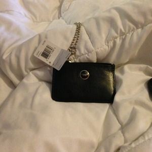 Black leather Coach id skinny