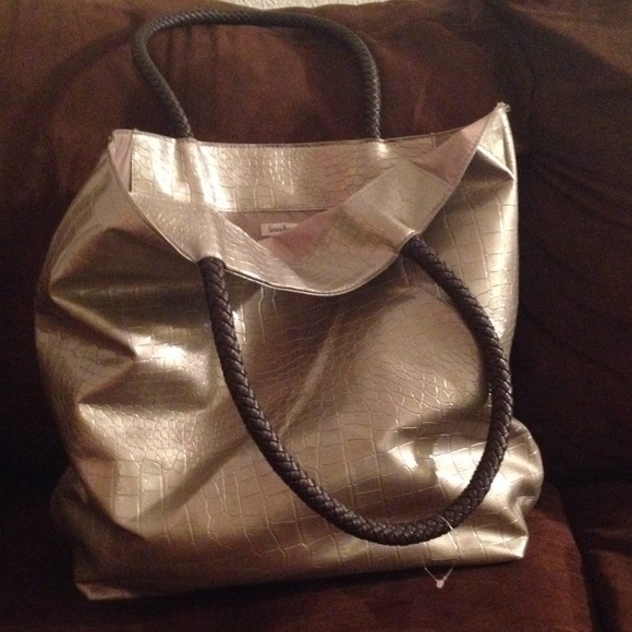 Gold- silver ish colored Neiman Marcus tote.
