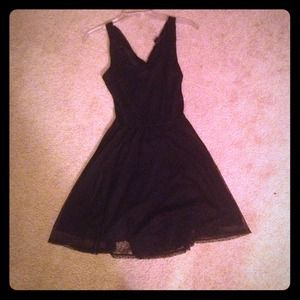 Black dress with criss-cross back and open back