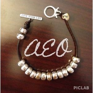 Leather bracelet with silver beads