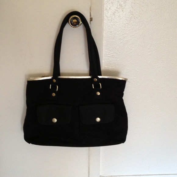 Black suede bag with gold and pewter accents.