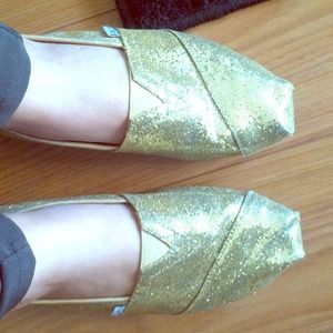 Gold sparkly Toms.