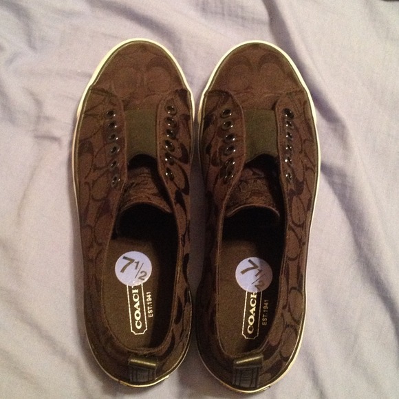 Black COACH slip ons