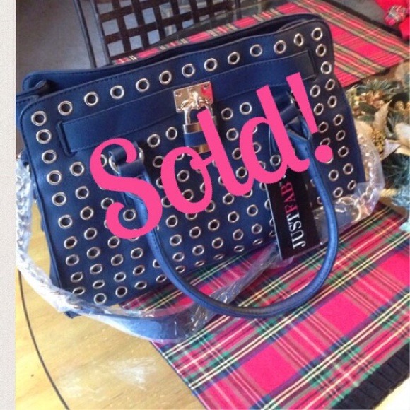 Gilded Handbag in Black with Grommets