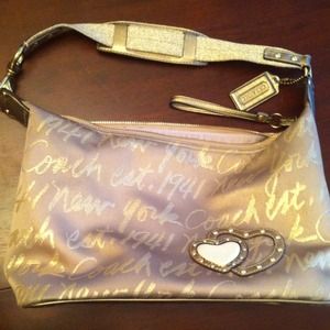 large gold coach tote with original tag!