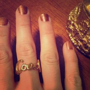 Brand new gold Coach logo ring
