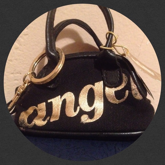 🎀FREE GIFT🎀 Mini VS key chain purse