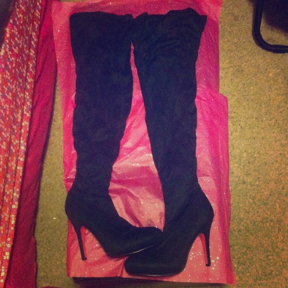 Thigh high black suede boots
