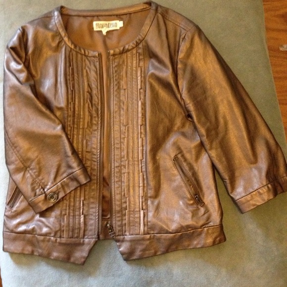 **Sold** Faux leather, 3/4 length sleeved jacket.