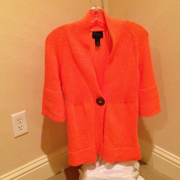 PURE handknit cardigan.