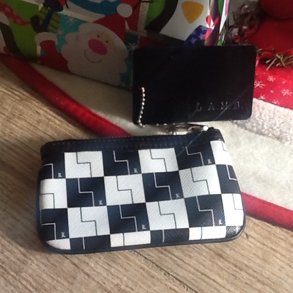 SOLD ON EBAY.    LAMB coin purse new