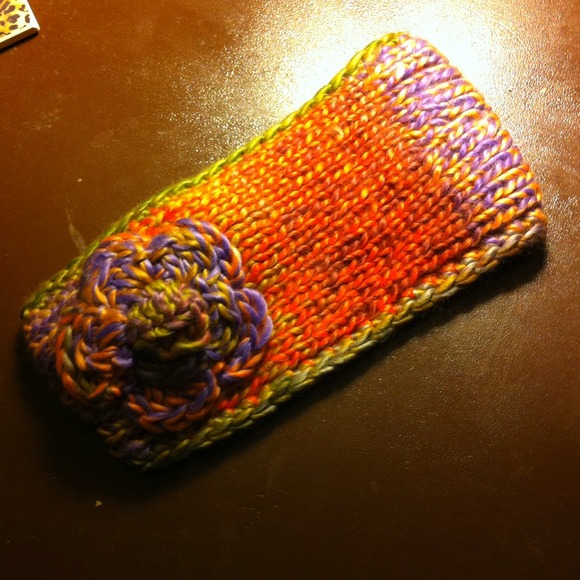 Crocheted multi colored headband with flower - Picture 1 of 3