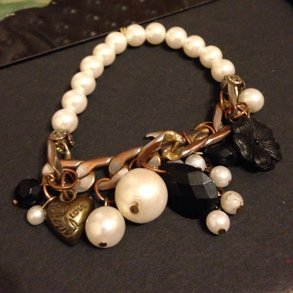 Pearl and charm bracelet