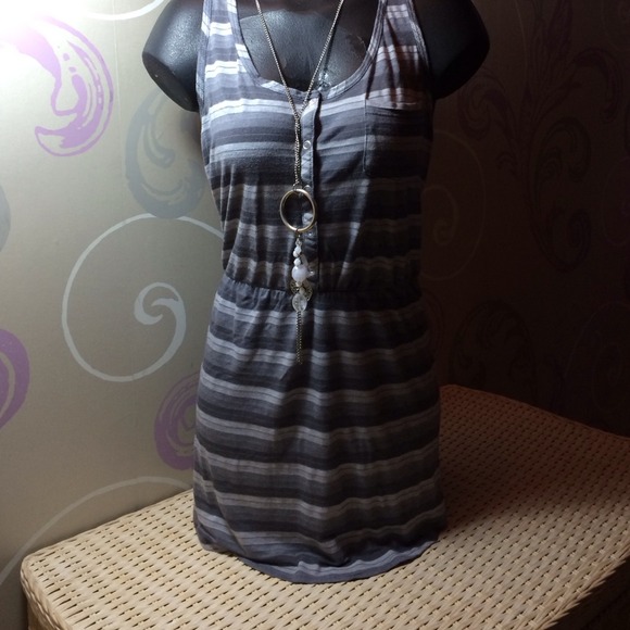 Short gray striped summer dress .