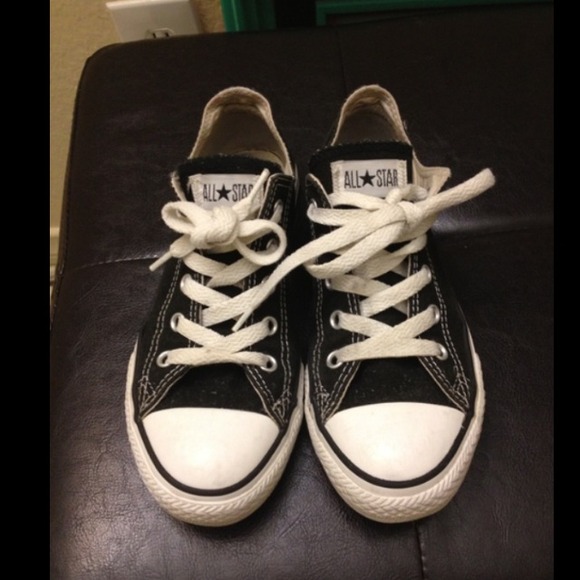 Black and white converse .
