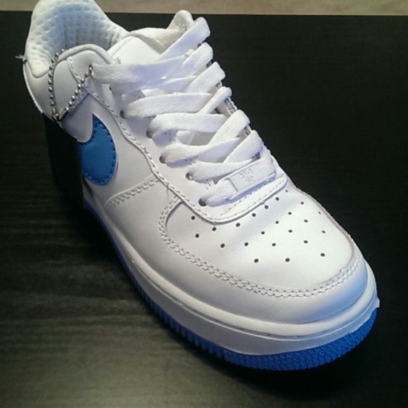 White and teal air force ones