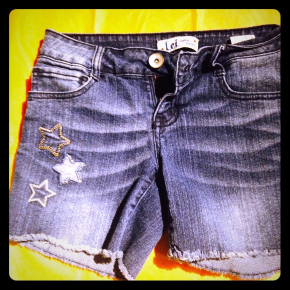 Distressed denim shorts