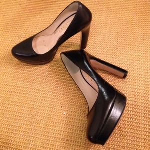 Prada 4" black platform pumps