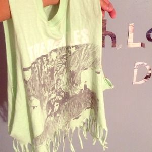 This is a Beatles muscle cropped fringe shirt!