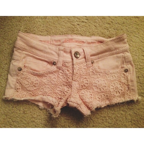 Light pink floral denim cutoff shorts