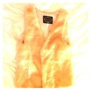 Cream faux fur vest