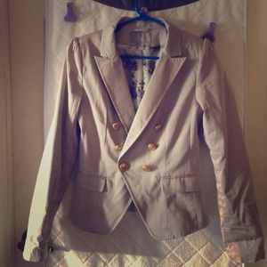 Beige fitted blazer with gold button detail
