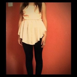 A peach strapless shirt