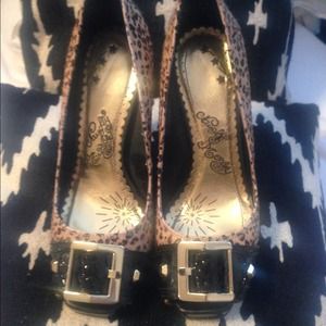 Naughty Monkey calf hair leopard peep toe pumps