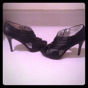 Leather bootie heels.  Worn once! Great condition!
