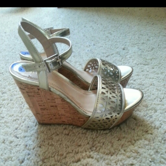 Sold: BCBG Gold Wedges