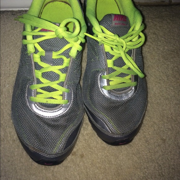 Gray pink and neon yellow Nike's