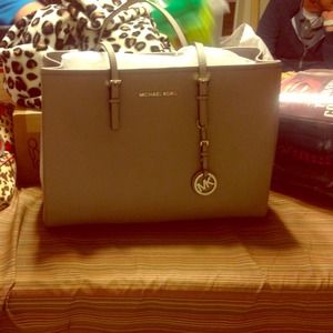 Mk brand new never worn!! Comes with dust bag