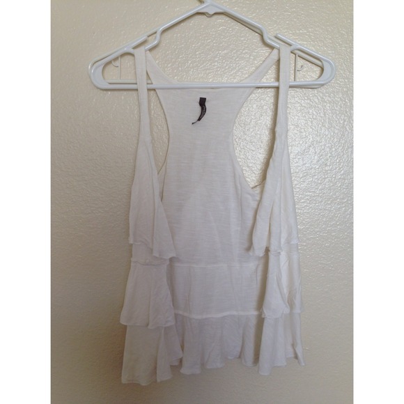 White ruffle vest