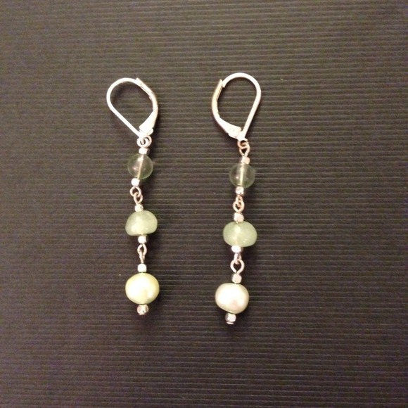 Green beaded dangly earrings