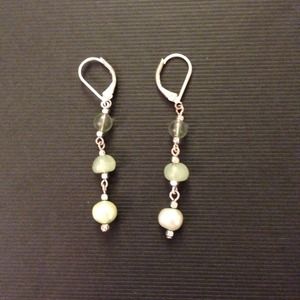 Green beaded dangly earrings