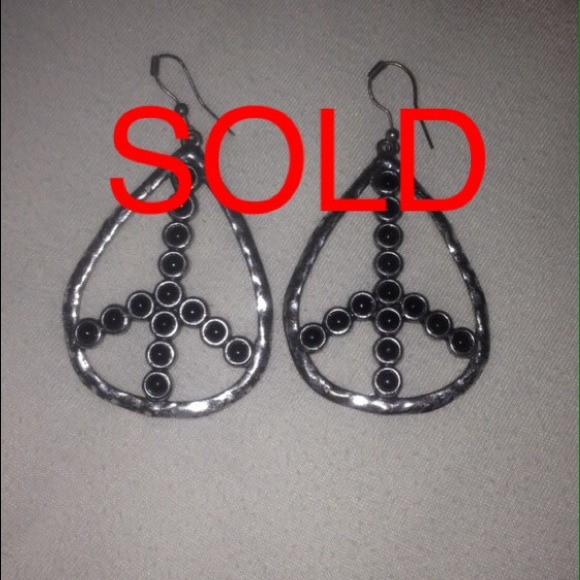 Sold...Bundled Peace sign earrings.
